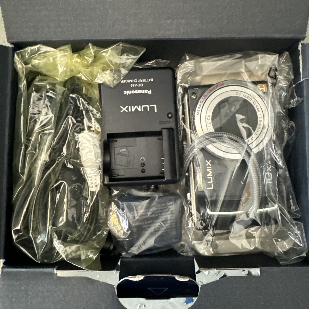 Panasonic Lumix DMC-TZ4 8.1MP Digital Camera Battery & Charger New Open Box